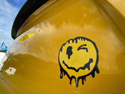 MELTING SMILEY FACE STICKER