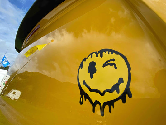 MELTING SMILEY FACE STICKER
