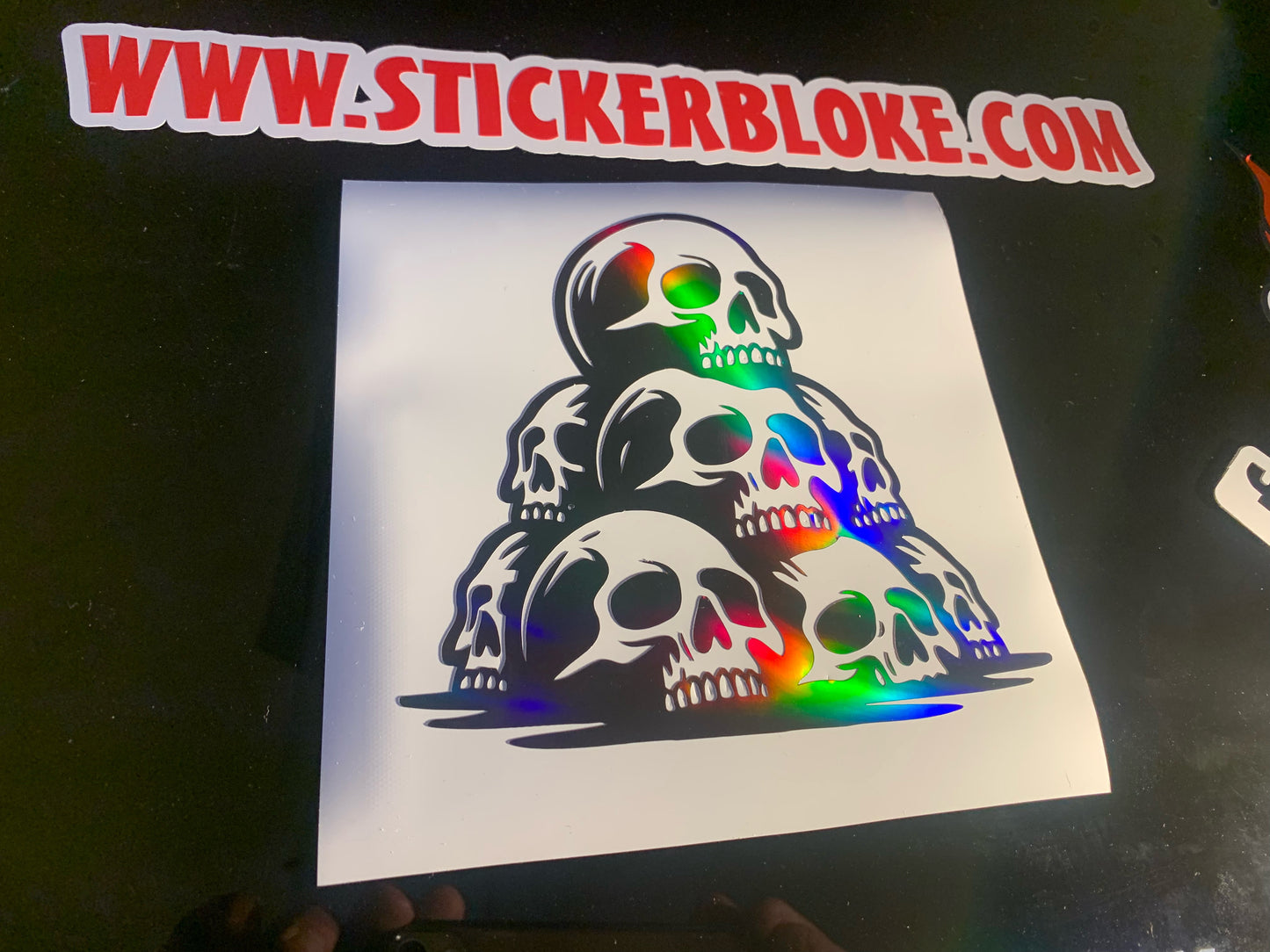 SKULLS IN A PILE STICKER